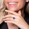 Platinum Emerald Cut 4.11ct Tanzanite and Diamond Halo Ring