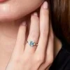 9ct White Gold 0.12ct Diamond and 1.00ct Blue Topaz Ring