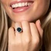 18ct White Gold Diamond 0.22ct and London Blue 5.21ct Halo Ring