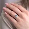18ct White Gold 0.80ct Pear Shape Blue Topaz Ring with Diamond Halo and Shoulders