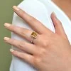 18ct white gold 3.06ct cushion cut citrine and 0.30ct round brilliant diamond claw set cluster with diamond shoulders