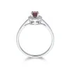 9ct White Gold Oval Cut Garnet 0.53ct Diamond Halo Ring