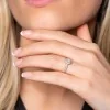 9ct White Gold Oval Cut Opal 0.53ct Diamond Halo Ring