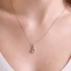 9ct White Gold Round Brilliant 0.33ct Diamond Twist Drop Pendant