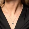 9ct White Gold Diamond 0.18ct and Sapphire Halo Pendant
