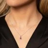 9ct White Oval Gold Ruby and Diamond Halo Pendant