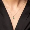 9ct White Gold 0.06ct Diamond and Emerald Halo Pendant
