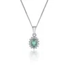 9ct White Gold 0.06ct Diamond and Emerald Halo Pendant