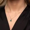 18ct White Gold Oval Cut 1.11ct Emerald and Diamond Halo Pendant