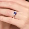 9ct White Gold 0.10ct Diamond and 0.75ct Tanzanite Trilogy Ring