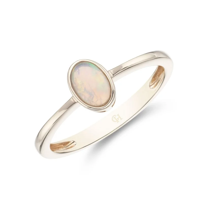 9ct Yellow Gold Oval Cut Opal 0.30ct Solitaire Ring