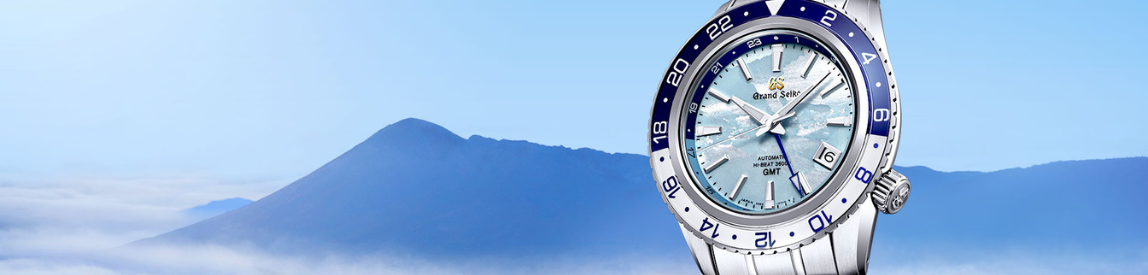 grand seiko sea of clouds watch with mountain background