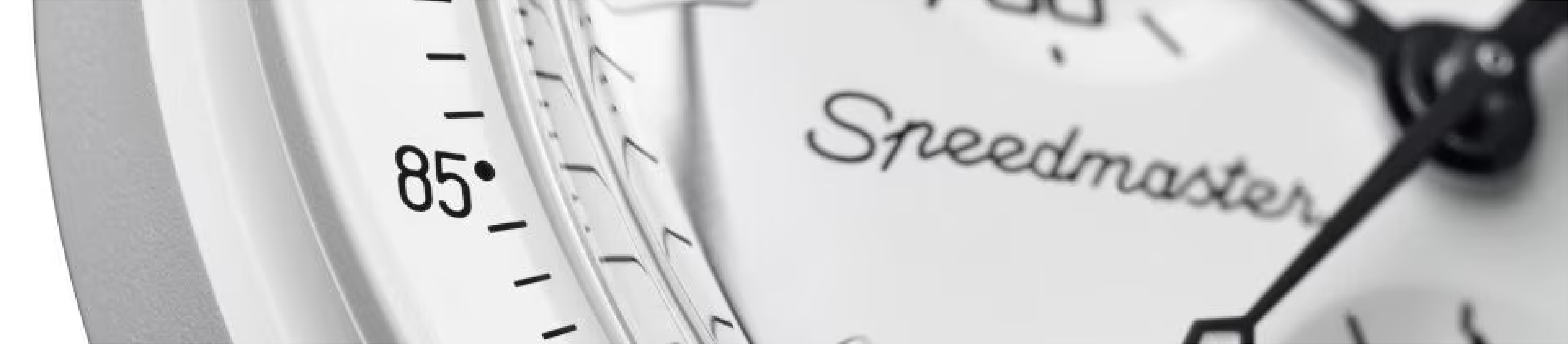 close up of speedmaster logo on dial