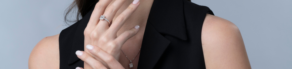 model shot of diamond ring and matching necklace