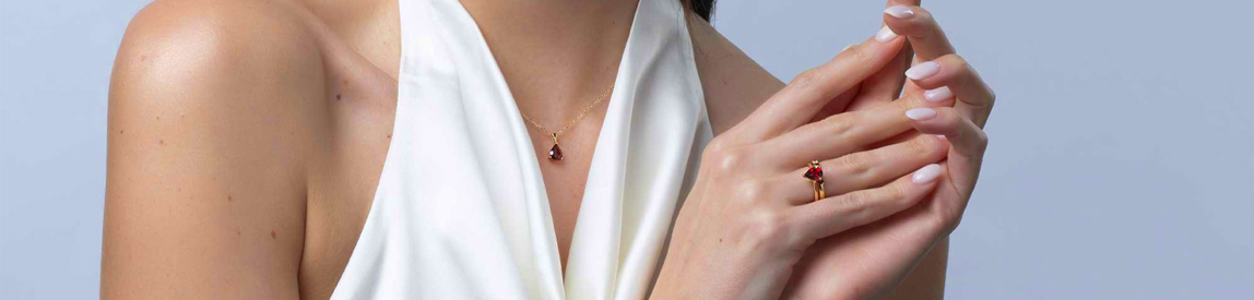 ruby jewellery​ - matching necklace and ring set on model