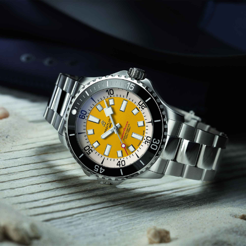 still life image of the breitling superocean automatic code yellow watch 