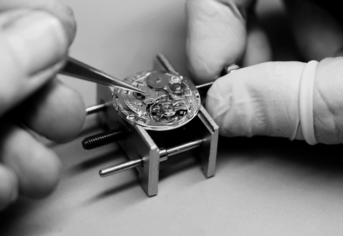 Timeless - Close-up image of a watch face being repaired